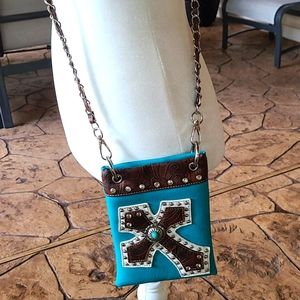 Turquoise Crossbody bag with brown studded cross